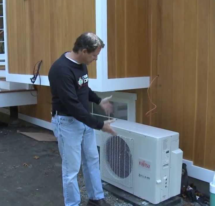 engineer inspecting cooling system